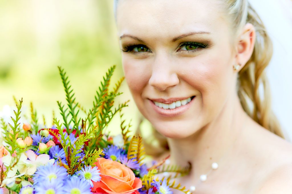 photo of a bride after manual editing with face-skin retouched and color brightened